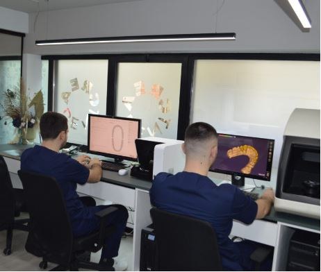 CAD/CAM design stations in Creadent's in-house laboratory, Tirana
