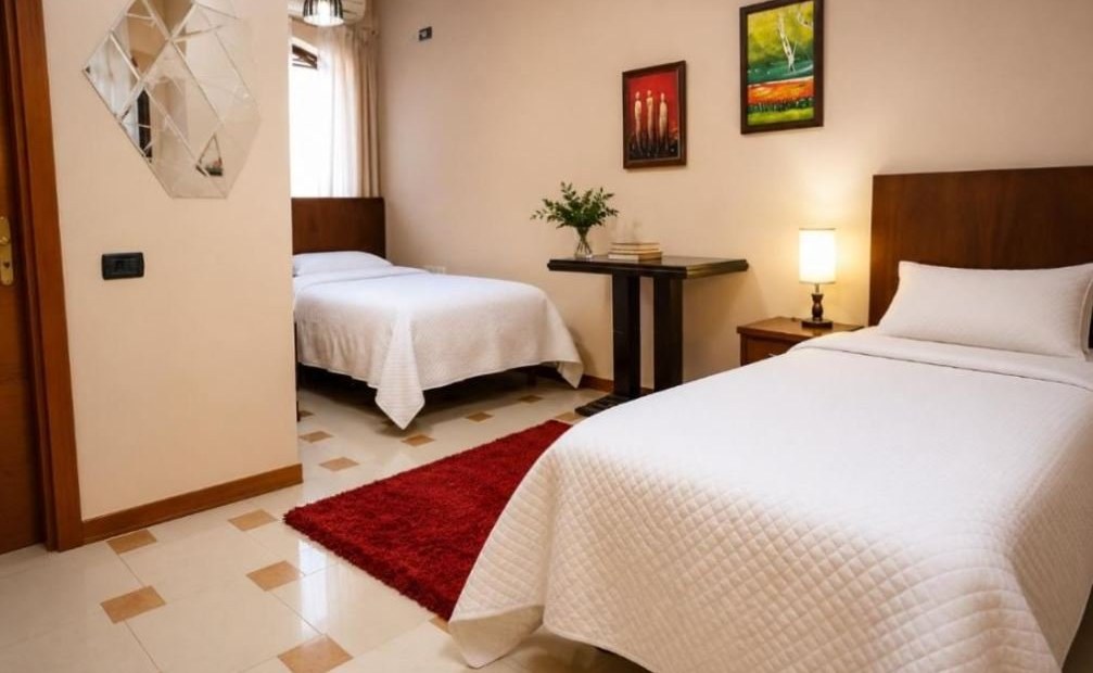 Twin room at Vila 15 — for a companion trip